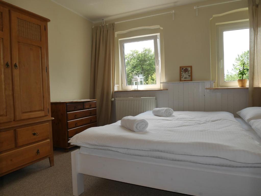 Postel nebo postele na pokoji v ubytování Sonja House Abertamy