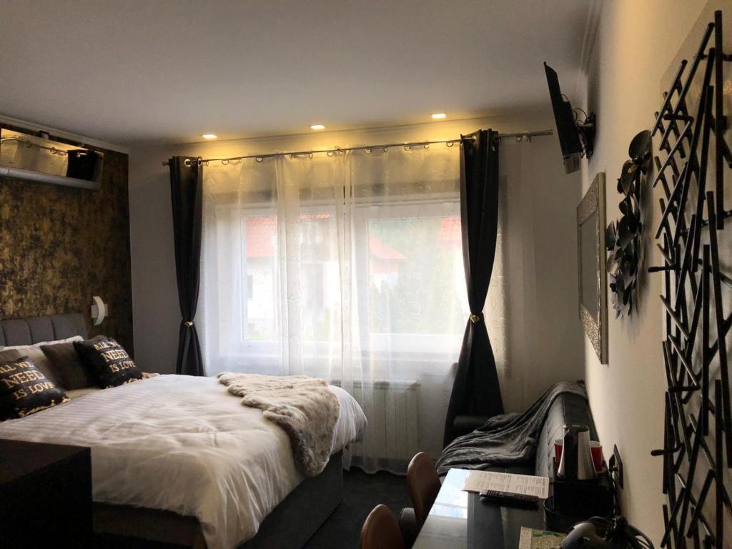 Postel nebo postele na pokoji v ubytování Luxury rooms Lira
