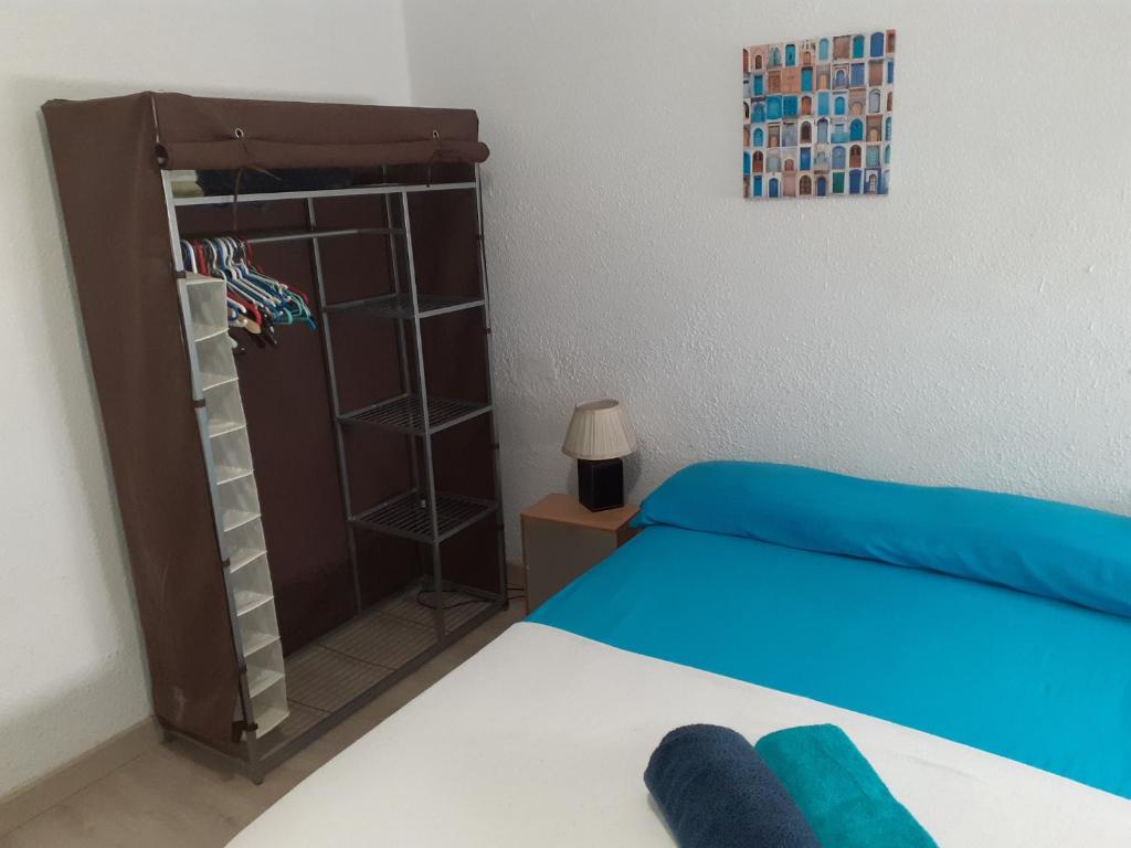 Postel nebo postele na pokoji v ubytování Smart Apartment near Malvarossa beach
