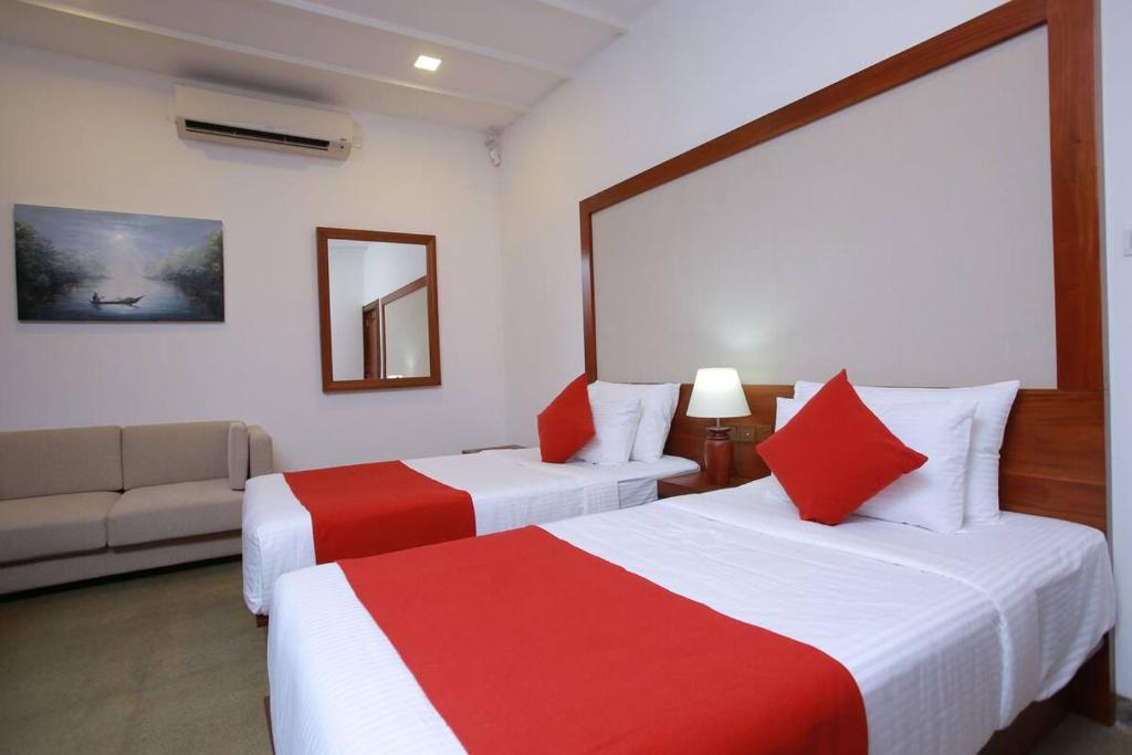 Postel nebo postele na pokoji v ubytování Tarshish Villa - Colombo
