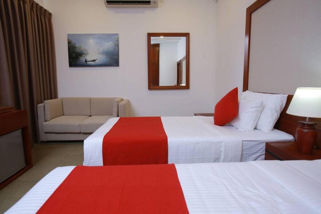 Postel nebo postele na pokoji v ubytování Tarshish Villa - Colombo