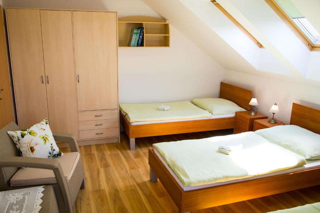 Postel nebo postele na pokoji v ubytování Vila Adria