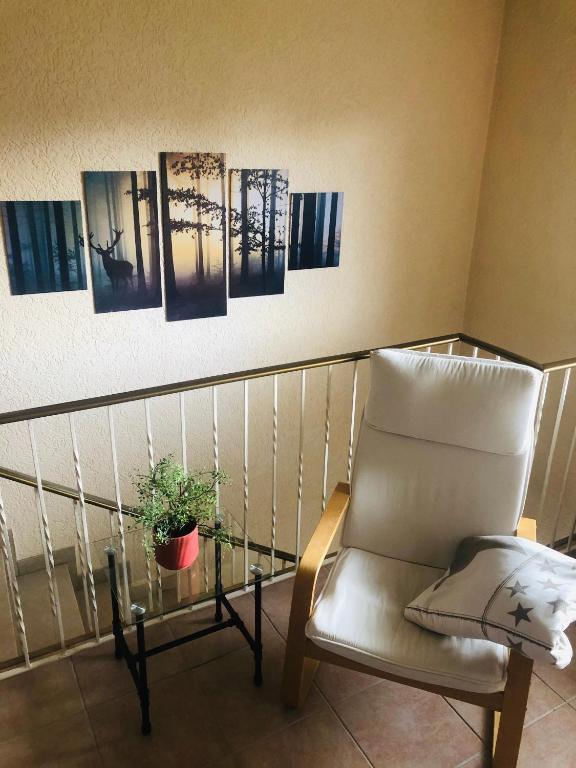 Posezení v ubytování Pension Platzhirsch