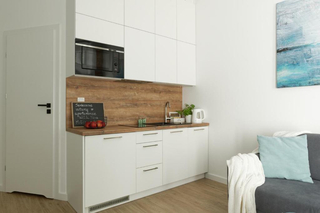 Kuchyňa alebo kuchynka v ubytovaní Apartament Wilda Nova
