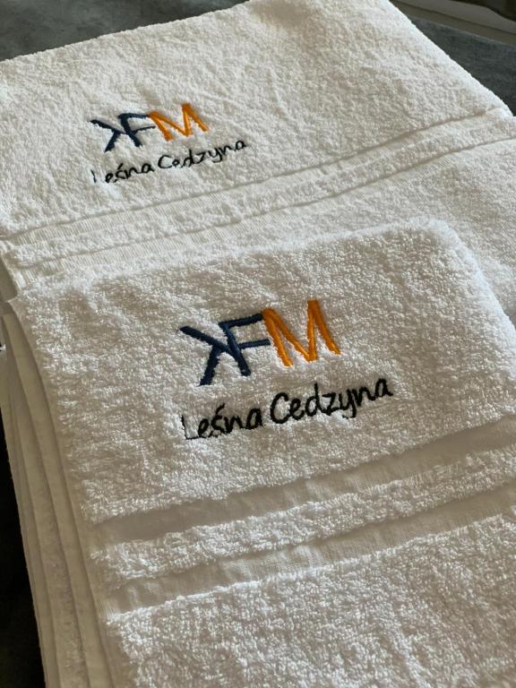 a close up of two towels on a bed at apartament LeśnaCedzyna in Kielce