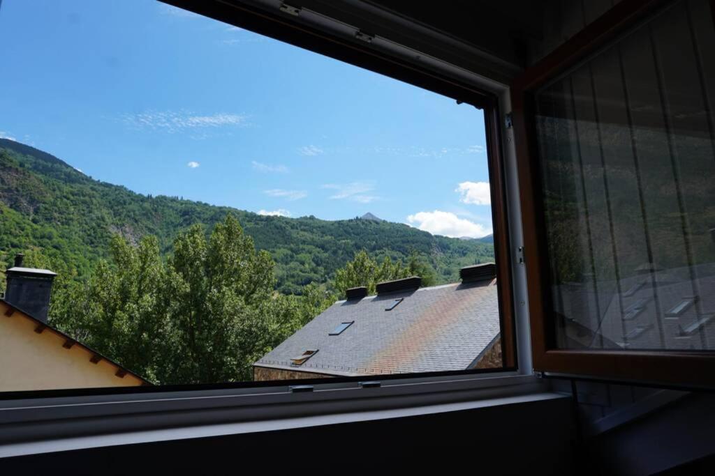 Nespecifikovaný výhled na hory nebo výhled na hory při pohledu z apartmánu