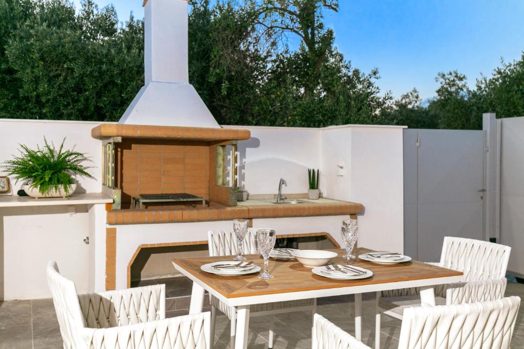 Balkón nebo terasa v ubytování Jacuzzi deluxe villa