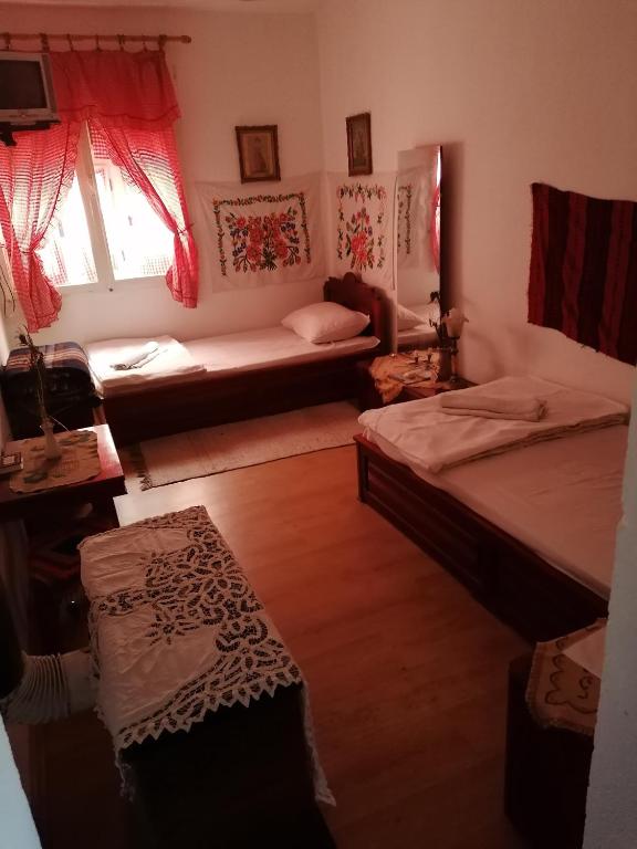 Postel nebo postele na pokoji v ubytování Etno Apartmani ''Vlaška kuća''