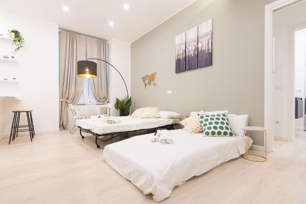 A bed or beds in a room at Apartment Greppi 5
