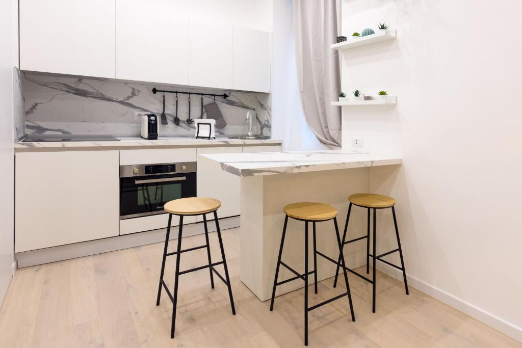 A kitchen or kitchenette at Apartment Greppi 5