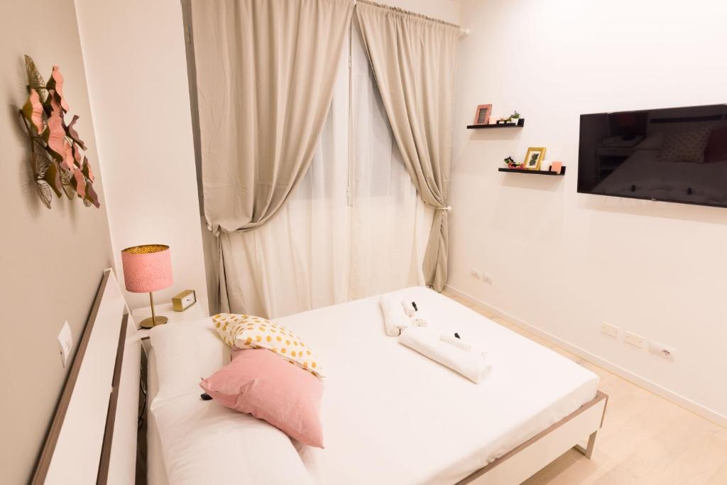 A bed or beds in a room at Apartment Greppi 5