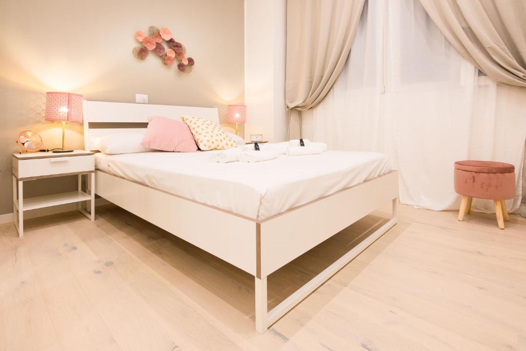 A bed or beds in a room at Apartment Greppi 5