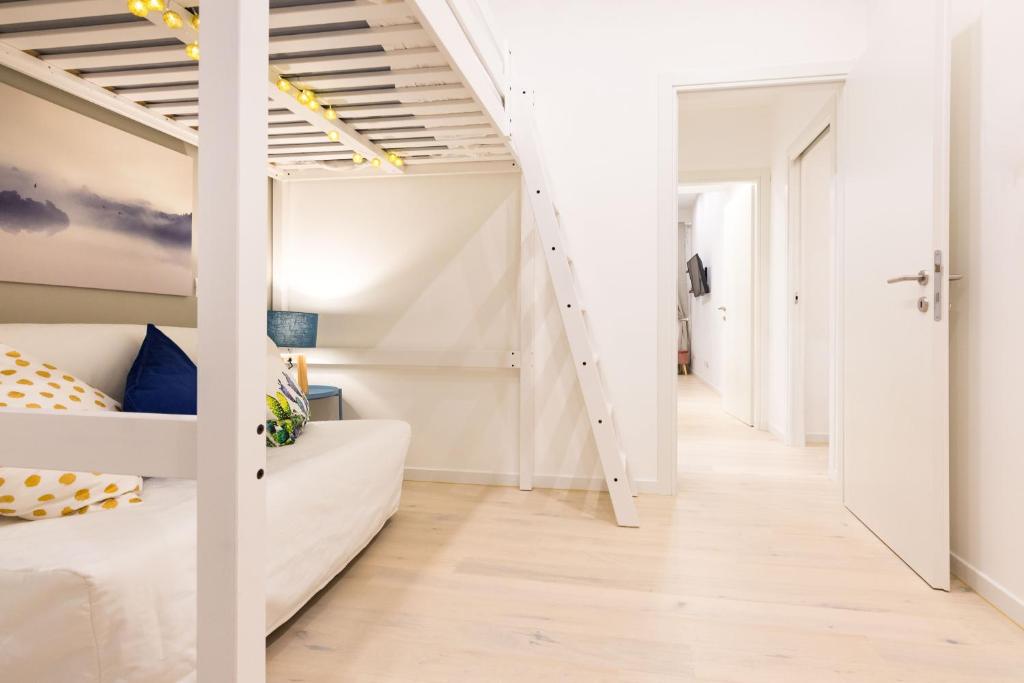 A bed or beds in a room at Apartment Greppi 5