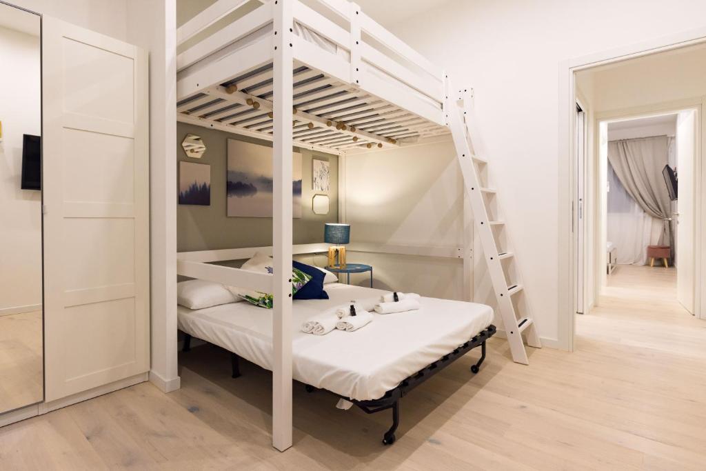 A bed or beds in a room at Apartment Greppi 5