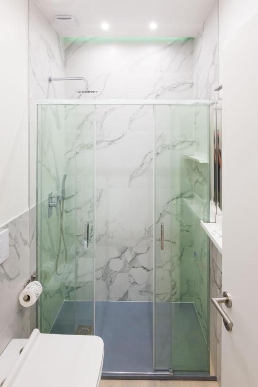 A bathroom at Apartment Greppi 5