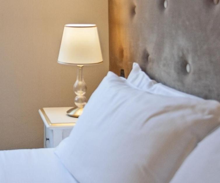 A bed or beds in a room at Palazzo Galletti Abbiosi