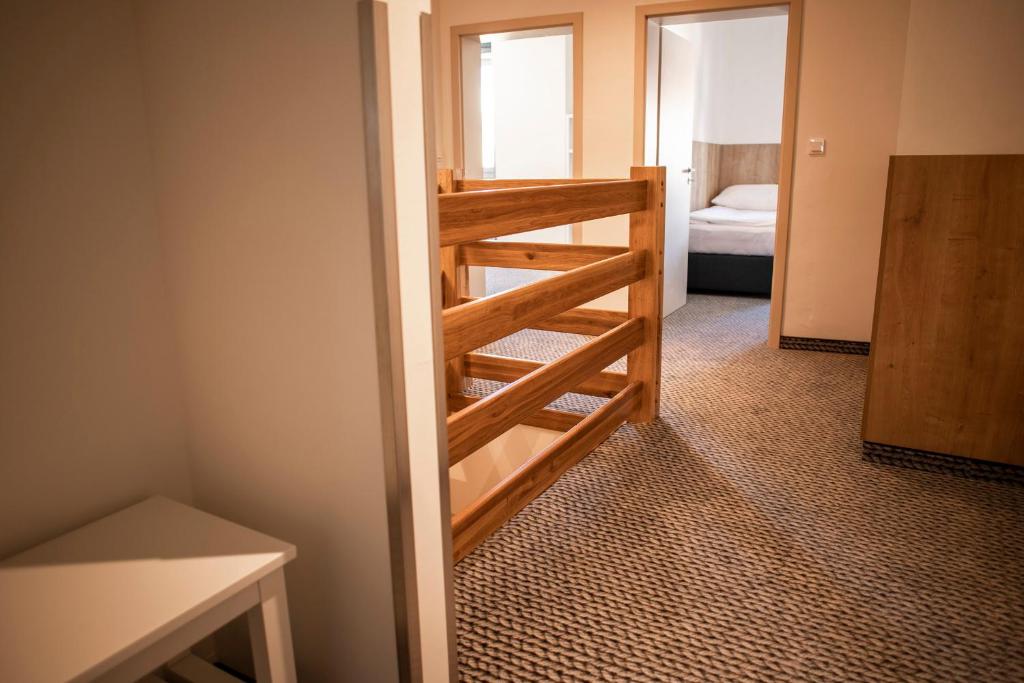 Postel nebo postele na pokoji v ubytování Apartmány Koflík
