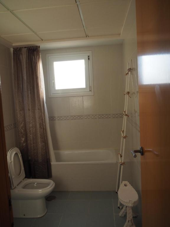 Koupelna v ubytování Amplio apartamento en primera línea de playa