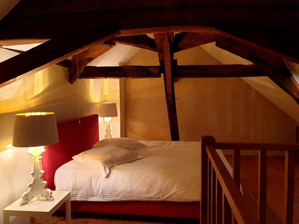 Postel nebo postele na pokoji v ubytování Restauberge Peitry