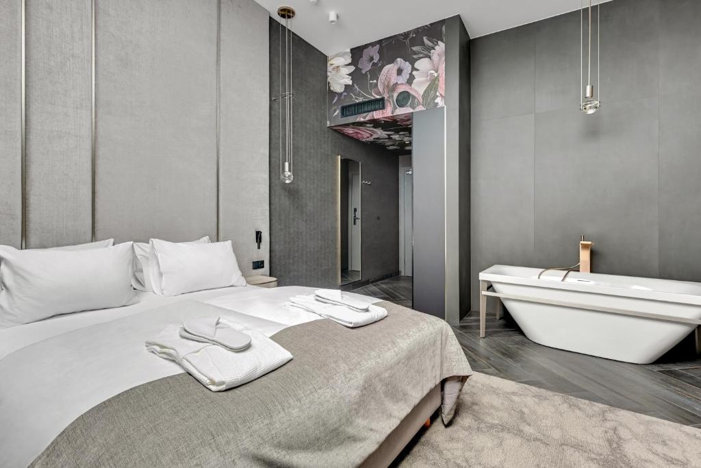 Posteľ alebo postele v izbe v ubytovaní HOTEL GRANO Gdańsk Old Town - GRANO HOTEL Gdańsk Old Town