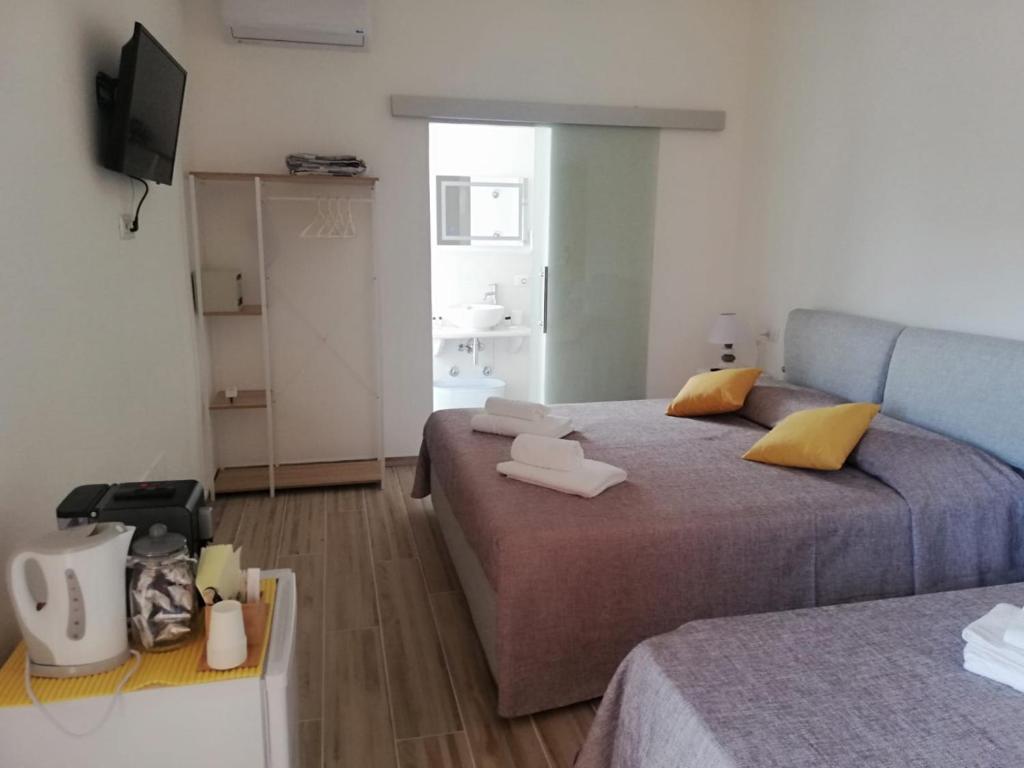 Letto o letti in una camera di Flamingo Guest House- Rooms