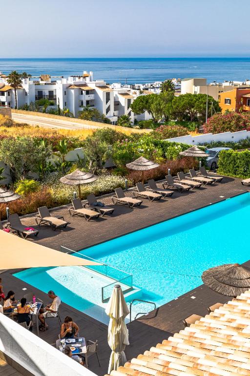 an overhead view of a swimming pool at a resort at Lagos Atlantic Hotel in Lagos
