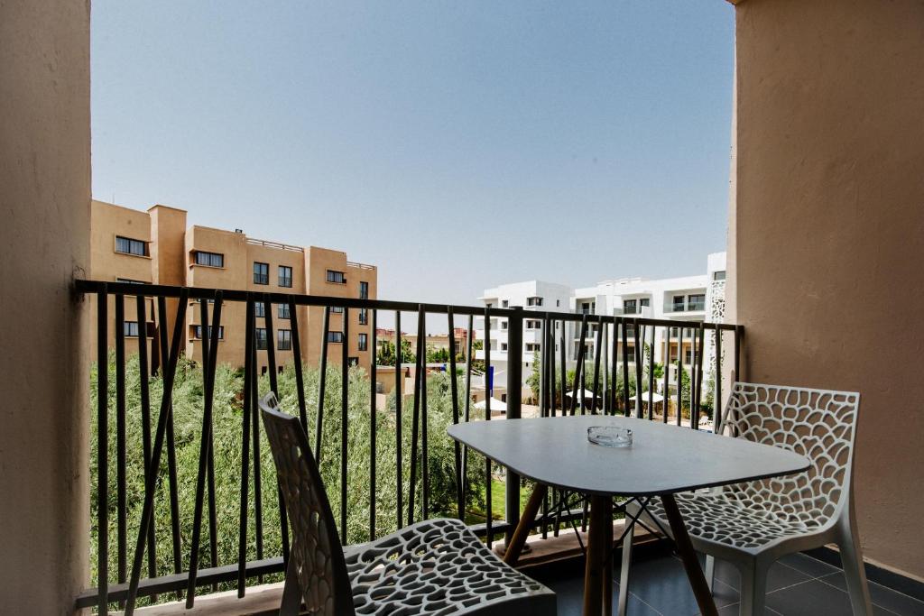 Rõdu või terrass majutusasutuses Wazo Appart-Hôtel