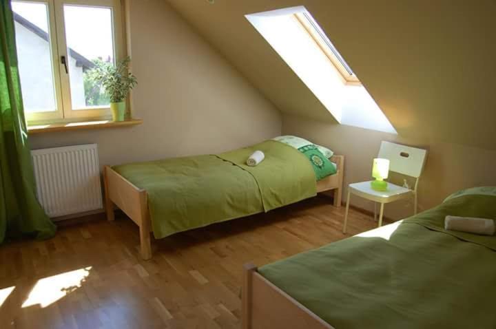 En eller flere senge i et værelse på Kibortowo