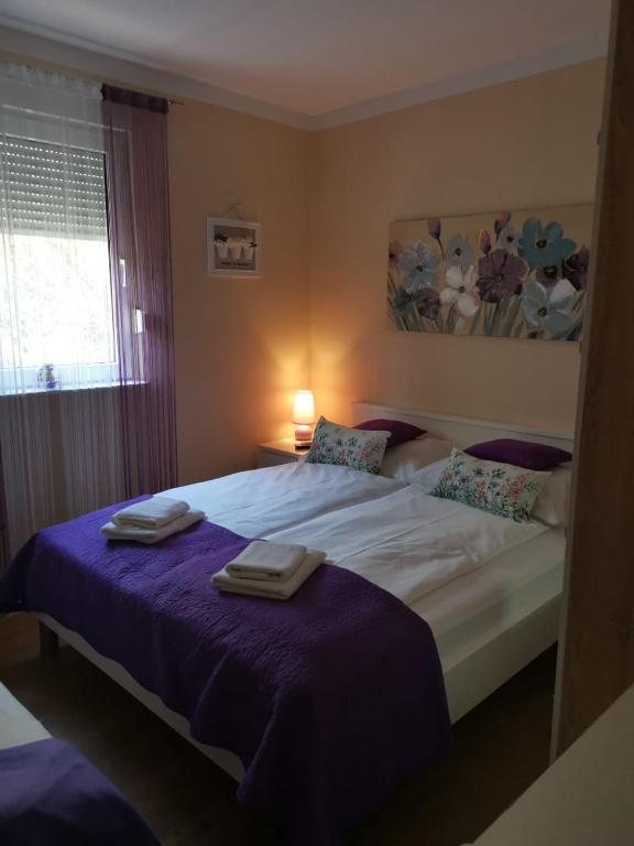 Posteľ alebo postele v izbe v ubytovaní Apartman Lučica