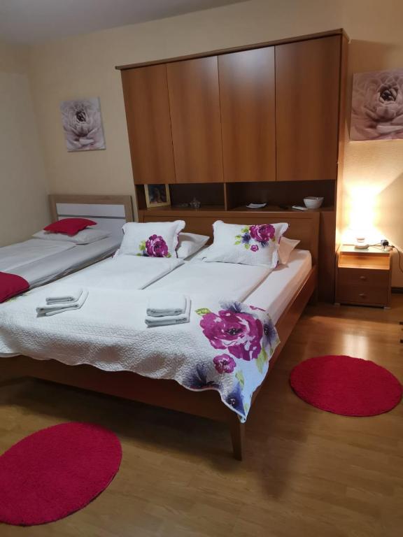 Posteľ alebo postele v izbe v ubytovaní Apartman Lučica