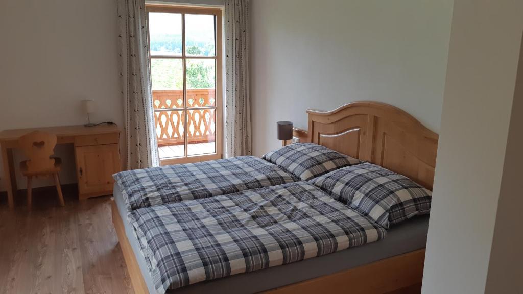 Postel nebo postele na pokoji v ubytování Landhaus Wolfgang