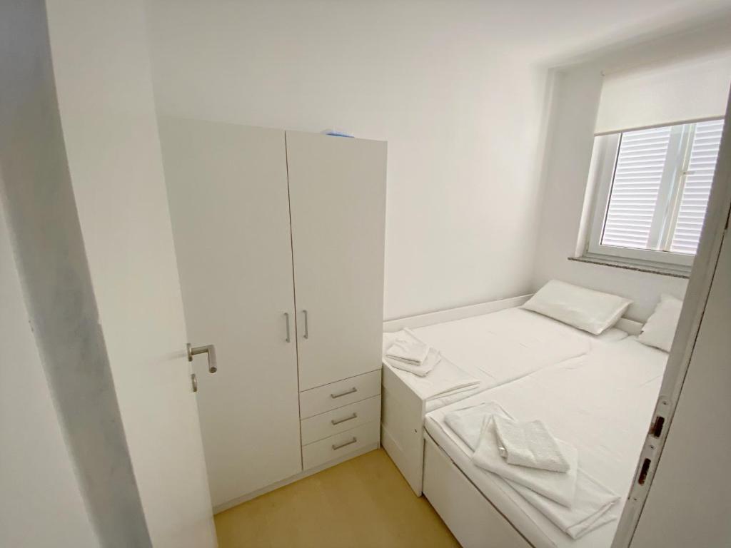 Postel nebo postele na pokoji v ubytování Apartment Bobby