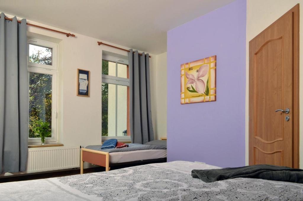 Postel nebo postele na pokoji v ubytování Apartmány Irisis