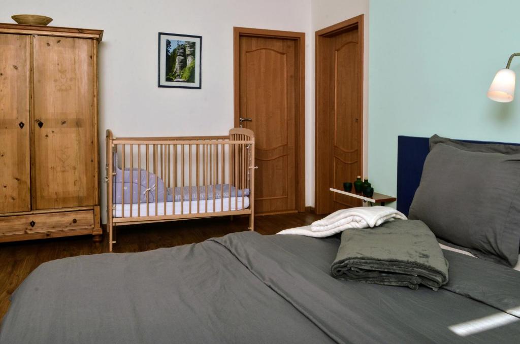 Postel nebo postele na pokoji v ubytování Apartmány Irisis