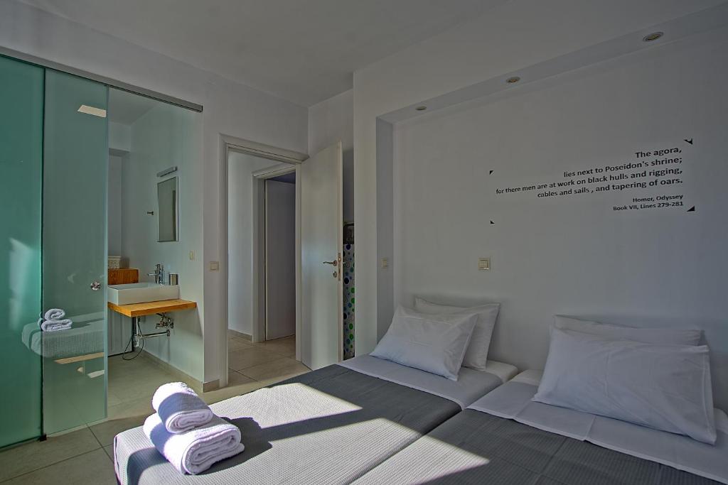 Postel nebo postele na pokoji v ubytování Villa Athena by PosarelliVillas