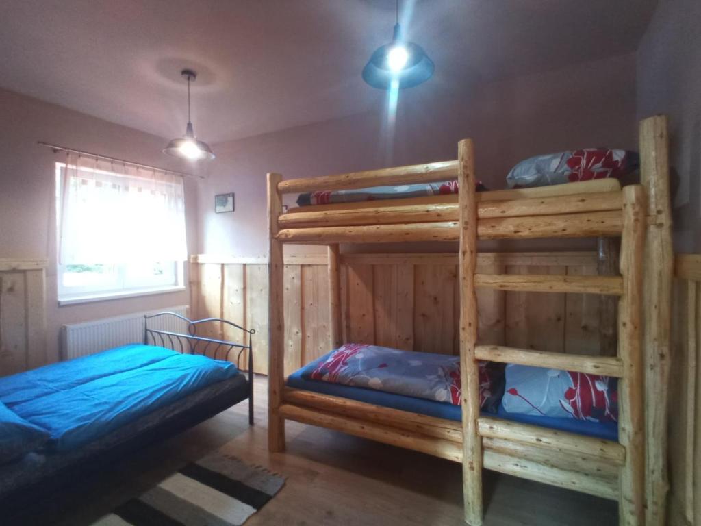 Postel nebo postele na pokoji v ubytování Chata Liptak