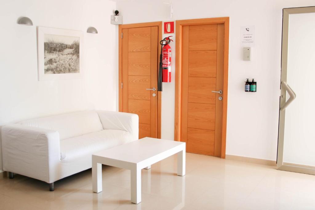 Postel nebo postele na pokoji v ubytování Apartamentos Catalina