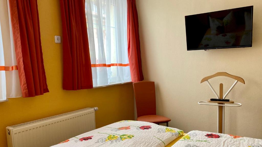 Postel nebo postele na pokoji v ubytování Frühstückspension Metilstein