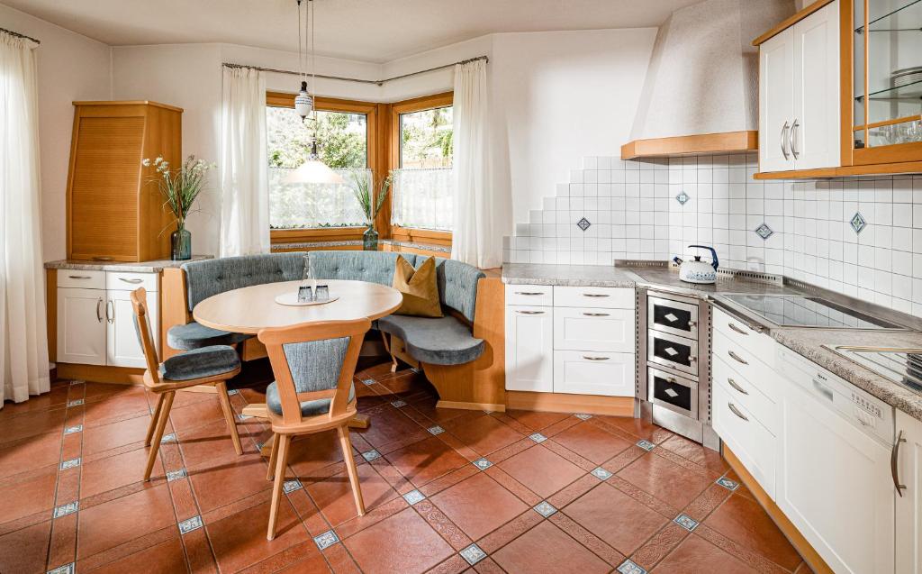 Kuchyň nebo kuchyňský kout v ubytování Hotel Brunnhofer