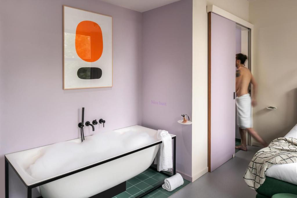 Llit o llits en una habitació de Hotel Unplugged