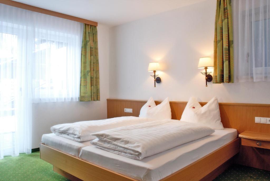Posteľ alebo postele v izbe v ubytovaní Chalet Lena
