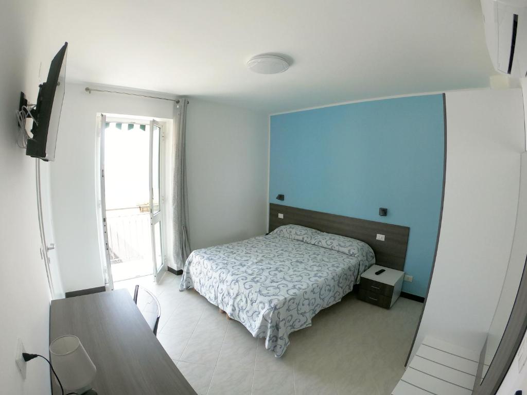 Postel nebo postele na pokoji v ubytování Hotel Aurora