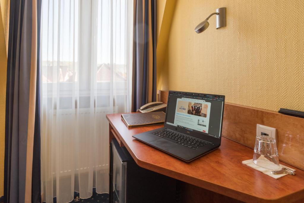 TV a/nebo společenská místnost v ubytování Aparthotel Astro - Nichtraucherhotel