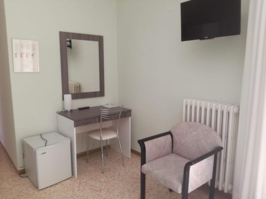 TV a/nebo společenská místnost v ubytování Hotel Saturno