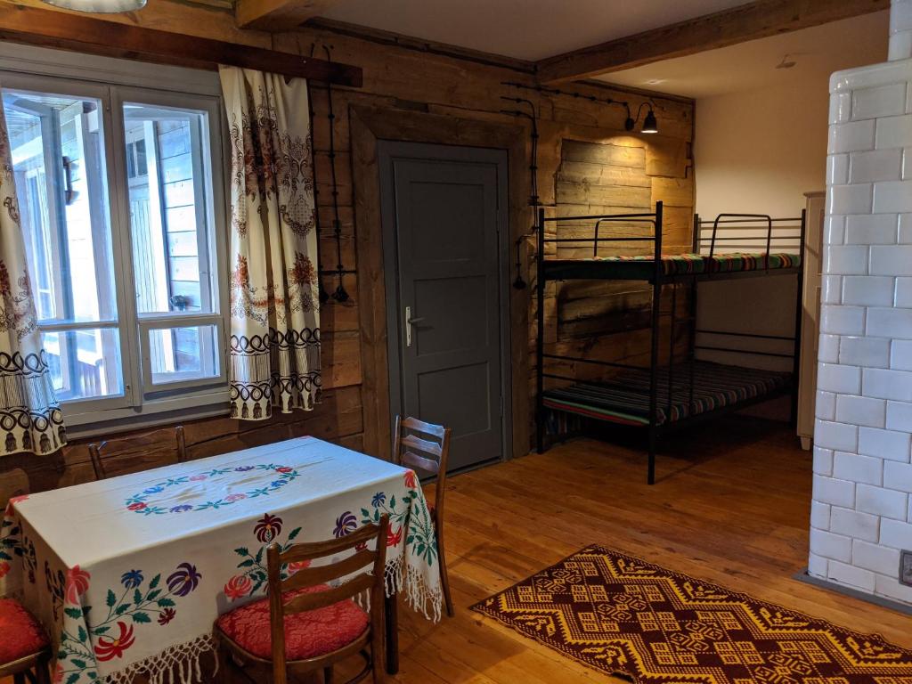 Postel nebo postele na pokoji v ubytování Domek pod Jabłonią