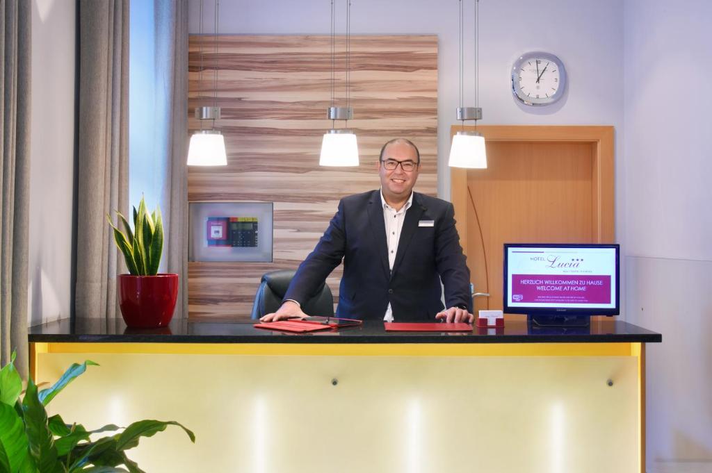 The lobby or reception area at Hotel Lucia