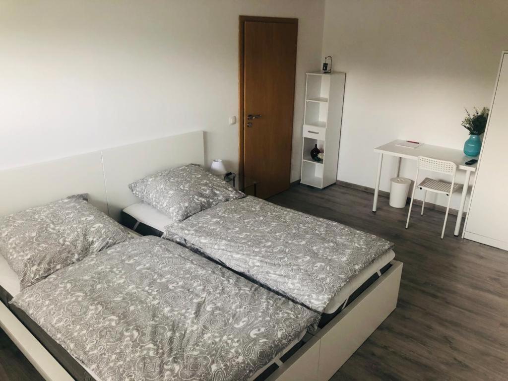 Postel nebo postele na pokoji v ubytování Pension Platzhirsch