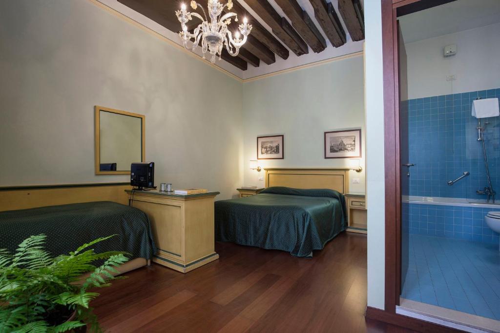 Postel nebo postele na pokoji v ubytování Zaguri B&B