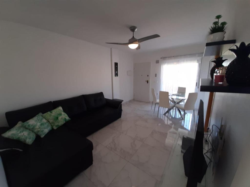 Posezení v ubytování Appartement avec Solarium