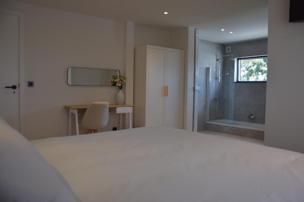 Postel nebo postele na pokoji v ubytování B&B Villa Mimosa